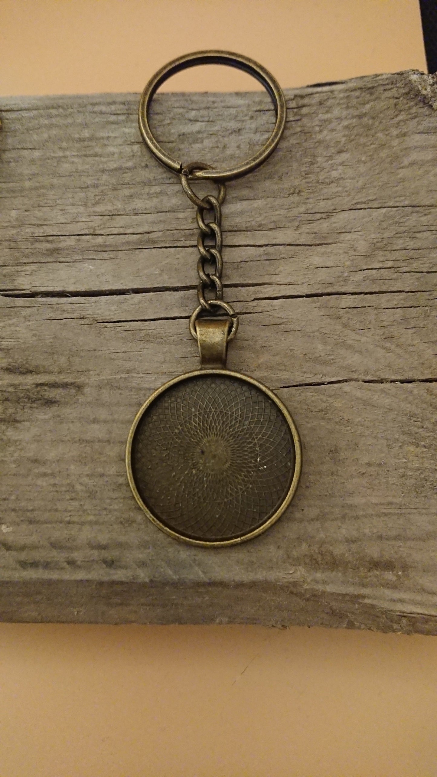 Stainless steel pendant "Initial" made from hair